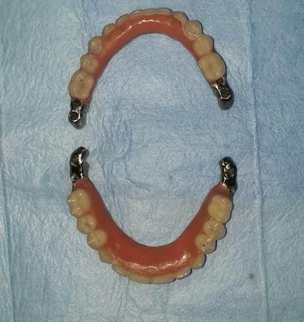 Dentist reviewing advanced diagnostic and OPG images on screen